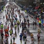 Runners headed toward the finish on Boylston Street on Monday. 